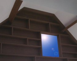 Réalisation d'une bibliothèque sous rampant